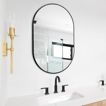 Milly 24 in. W x 36 in. H Medium Oval Metal Framed Wall Mirror - JONATHAN Y